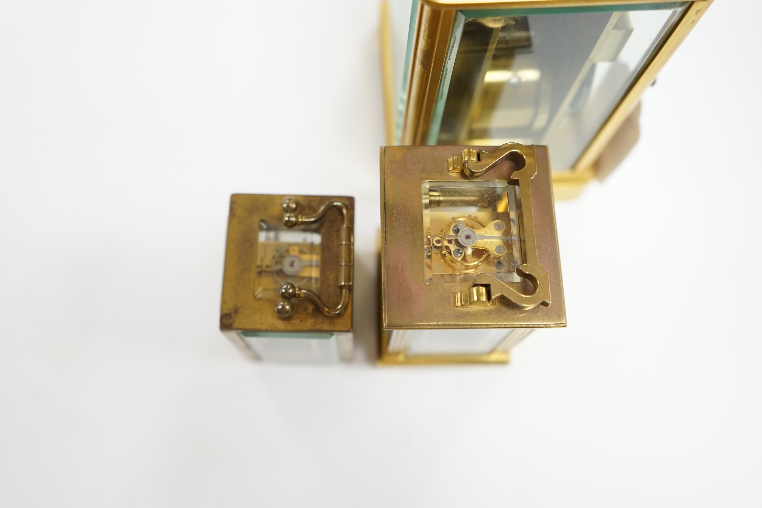 A French carriage clock and two other miniature carriage clocks, largest 13cm high. Condition - fair to good, not tested as working